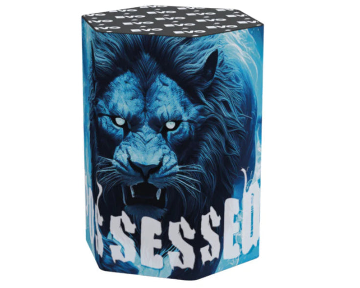 Hexagonal fireworks packaging featuring an illustration of a blue lion with bared teeth and glowing eyes, and the word "OBSESSED" in bold white letters.